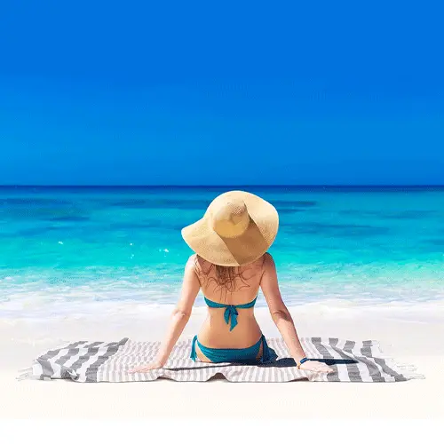 a beautiful lady beside a beach